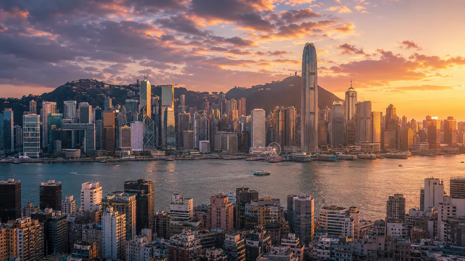 Hong Kong Victoria Harbour skyline at golden hour